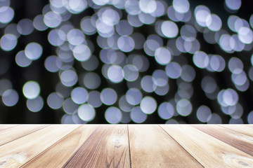 Close up wooden table with light blurred background