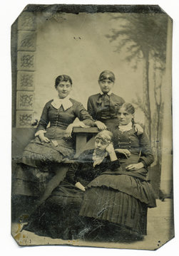 Tintype, circa 1880, USA, of girls posed in studio