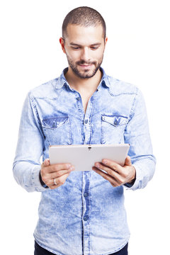 Casual man holding a digital tablet, isolated on white backgroun