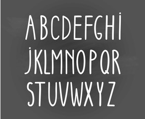 vector alphabet. letters written by hand on a gray background