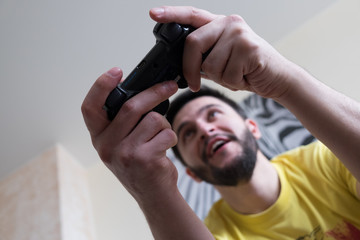 Bearded gamer with controller