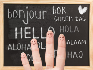 Hello in various languages on chalkboard © Dmitrii Kotin