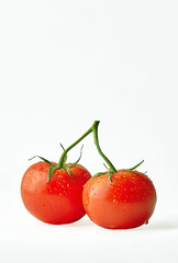 fresh tomatoes isolated on white