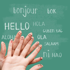 Hello in various languages on chalkboard © Dmitrii Kotin