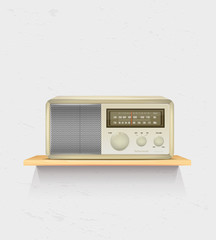 Retro radio on wooden shelf and white wall