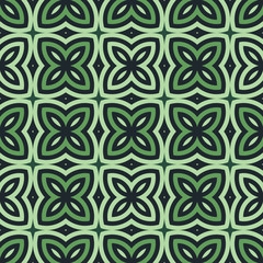 Green floral abstract background. Seamless pattern with symmetric geometric ornament.