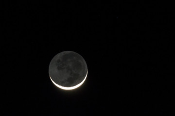 Crescent moon seen from Isalo, Madagascar - 109054020