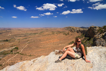 Tourist looking out over the beautiful landscape of Isalo national park in Madagascar