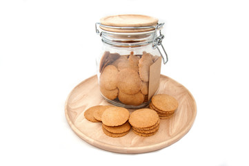 Jar full of chocolate chip cookies isolated on white background