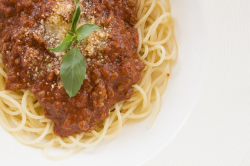 Tasty spaghetti with Meat sauce and basil.