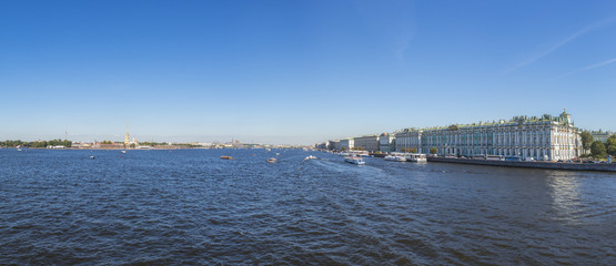 Fototapeta na wymiar Famous landmark of Saint Petersburg (Russia) - Winter Palace which houses Hermitage museum from Neva river arial panoramic view.