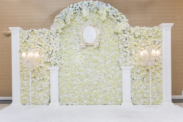 Beautiful white wedding backdrop with flower