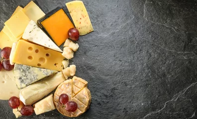Foto op Plexiglas Various types of cheese with empty space background © azure