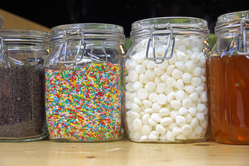 jars of colored sugar