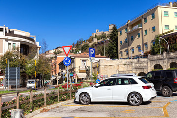 The traditional picturesque houses of San Marino. Car Parking