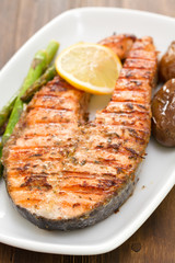 grilled salmon with potato on white dish