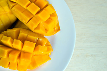 Sliced sweet mango served on the dish