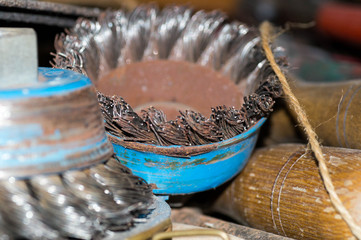Steel, rusty polishing disk in lateral view