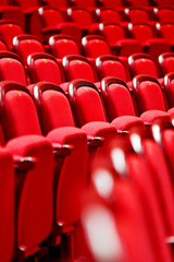 Rows with empty seats in a theater