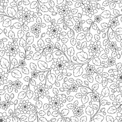 Seamless floral doodle background pattern in vector.