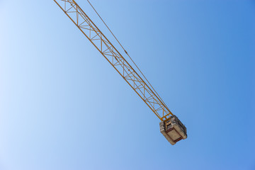 Naklejka premium Crane Part and Blue Sky