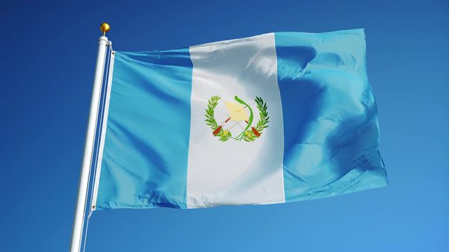 Guatemala flag waving in slow motion against clean blue sky, seamlessly looped, close up, isolated on alpha channel with black and white luminance matte, perfect for film, news, digital composition