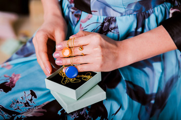 Woman showing beautiful Jewelry