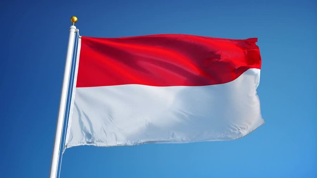 Indonesia flag waving in slow motion against clean blue sky, seamlessly looped, close up, isolated on alpha channel with black and white luminance matte, perfect for film, news, digital composition