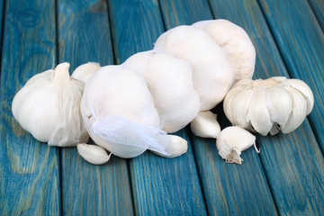 Garlic on rustic wooden table