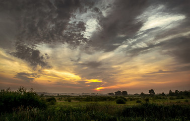Obraz na płótnie Canvas Sunrise in the field