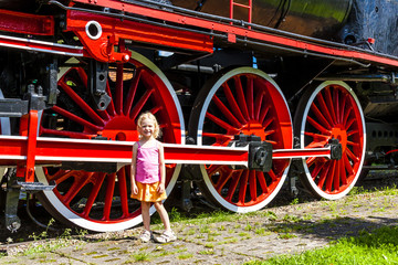 Fototapeta na wymiar little girl in railway museum, Koscierzyna, Pomerania, Poland