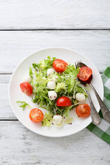 italian salad with tomatoes on plate