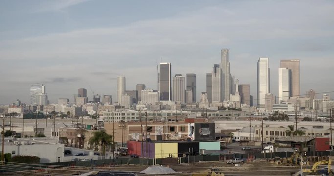 LOS ANGELES, CA, USA  - DECEMBER 2015:  Locked off shot of Downtown, viewed across the Arts District, morning. Originally recorded in 4K DCI.