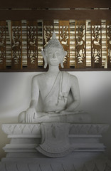 Raw concrete Buddha statue at Thai public temple