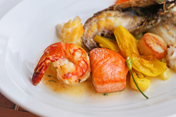 Seafood dish on a wooden table.