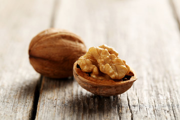 Walnuts on a grey wooden table