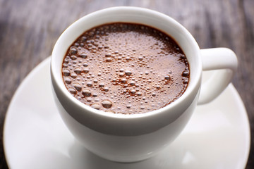 Cup of hot coffee, close up