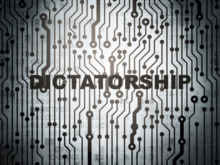 Politics concept: circuit board with Dictatorship