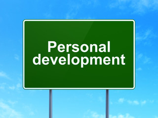 Studying concept: Personal Development on road sign background