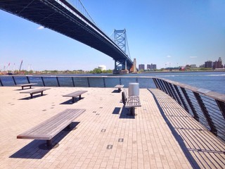 Race street pier public space with view at Benjamin Franklin Bridge in Philadelphia, Pennsylvania , USA