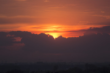 sunset on the background of the city from a height