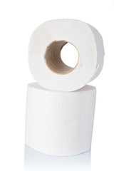 White paper napkins rolls on white background close-up.