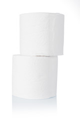 White paper napkins rolls on white background close-up.