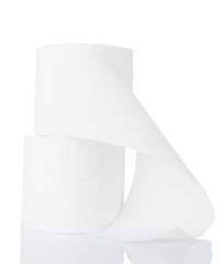 White paper napkins rolls on white background close-up.