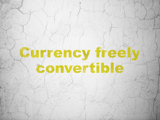 Money concept: Currency freely Convertible on wall background