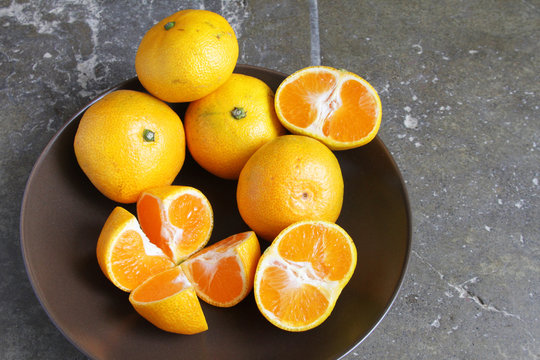 Bowl of Golden Tangerines © janmarie37