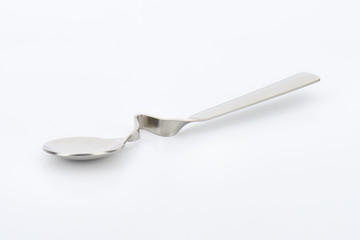 bent metal spoon
