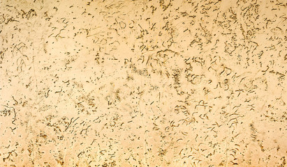 beige colored house front, structured with spatula techniques, background design