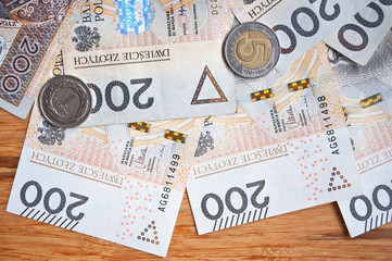 Background from 200 polish zloty and coins 