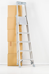 Moving carton boxes stack with ladder